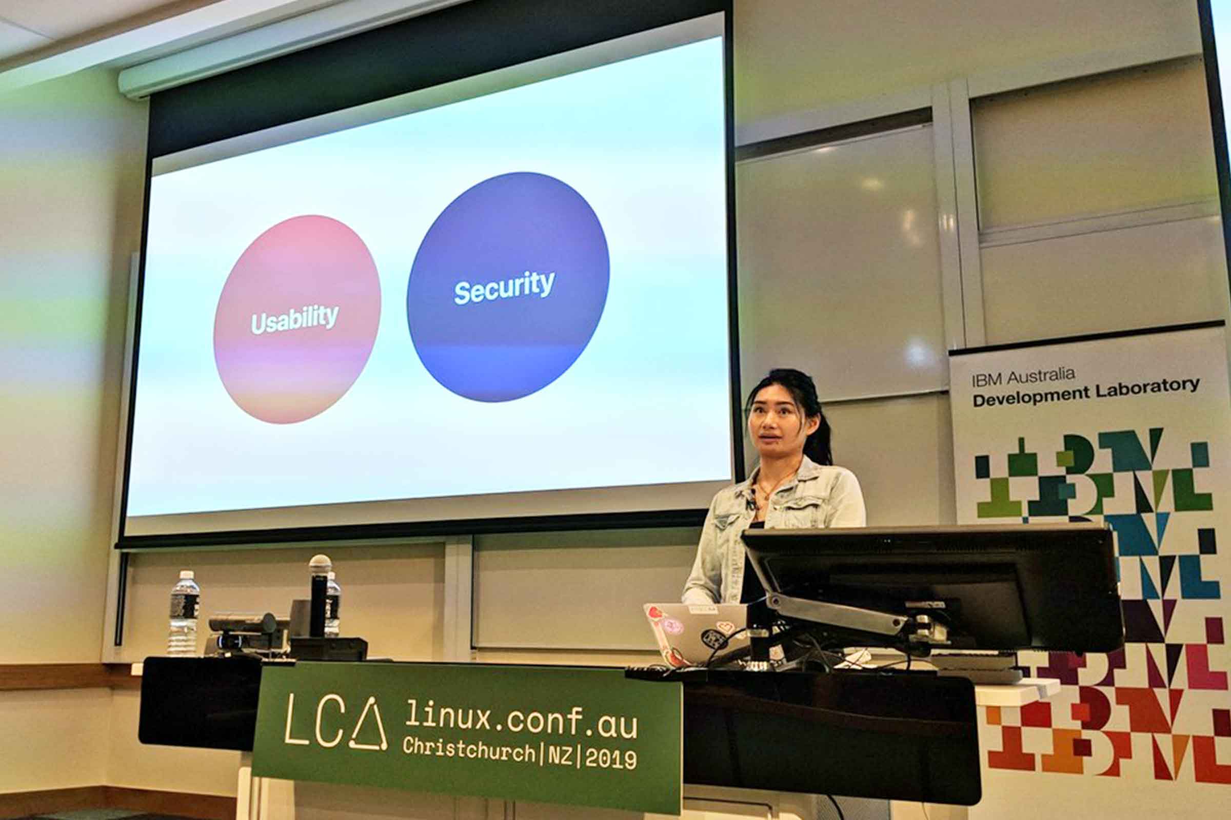 A photograph of me speaking at LinuxConf Australasia 2019